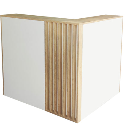 Mostrador de recepción en L de 130x110x40cm, altura 75/115cm, en melamina. Fabricado a medida para tiendas y oficinas.