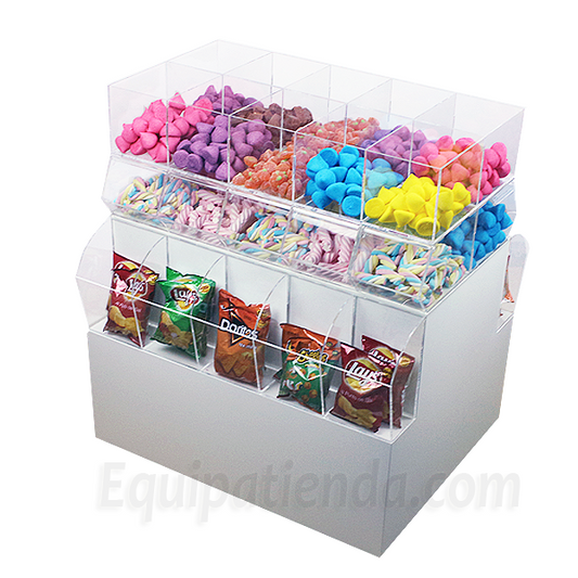 Isla central con carameleras y recipientes transparentes para golosinas y snacks.